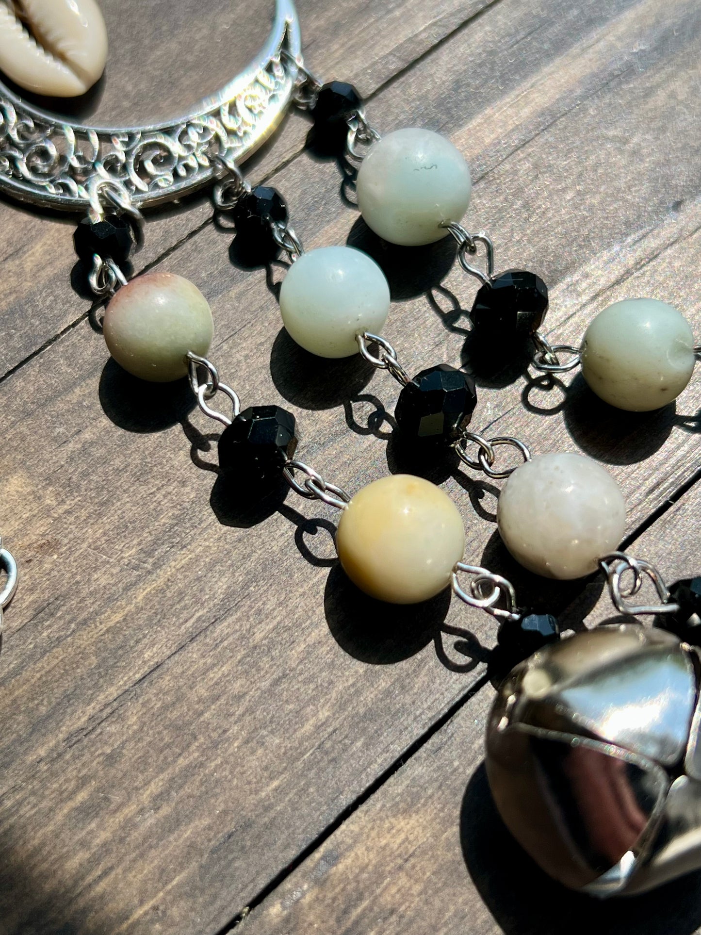 Shell moon witch bells