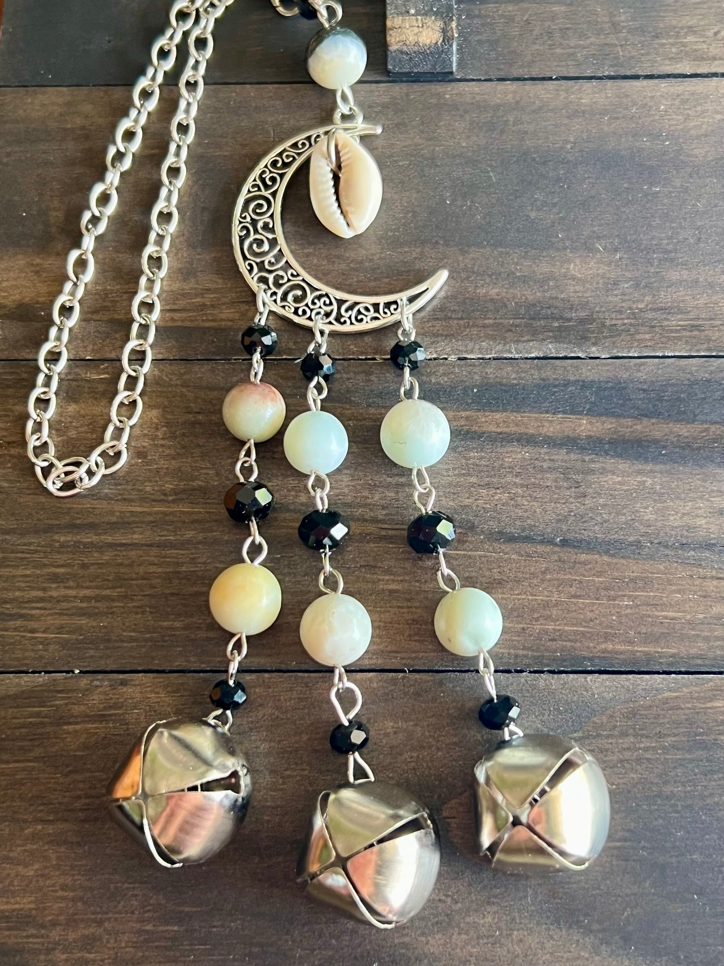 Shell moon witch bells