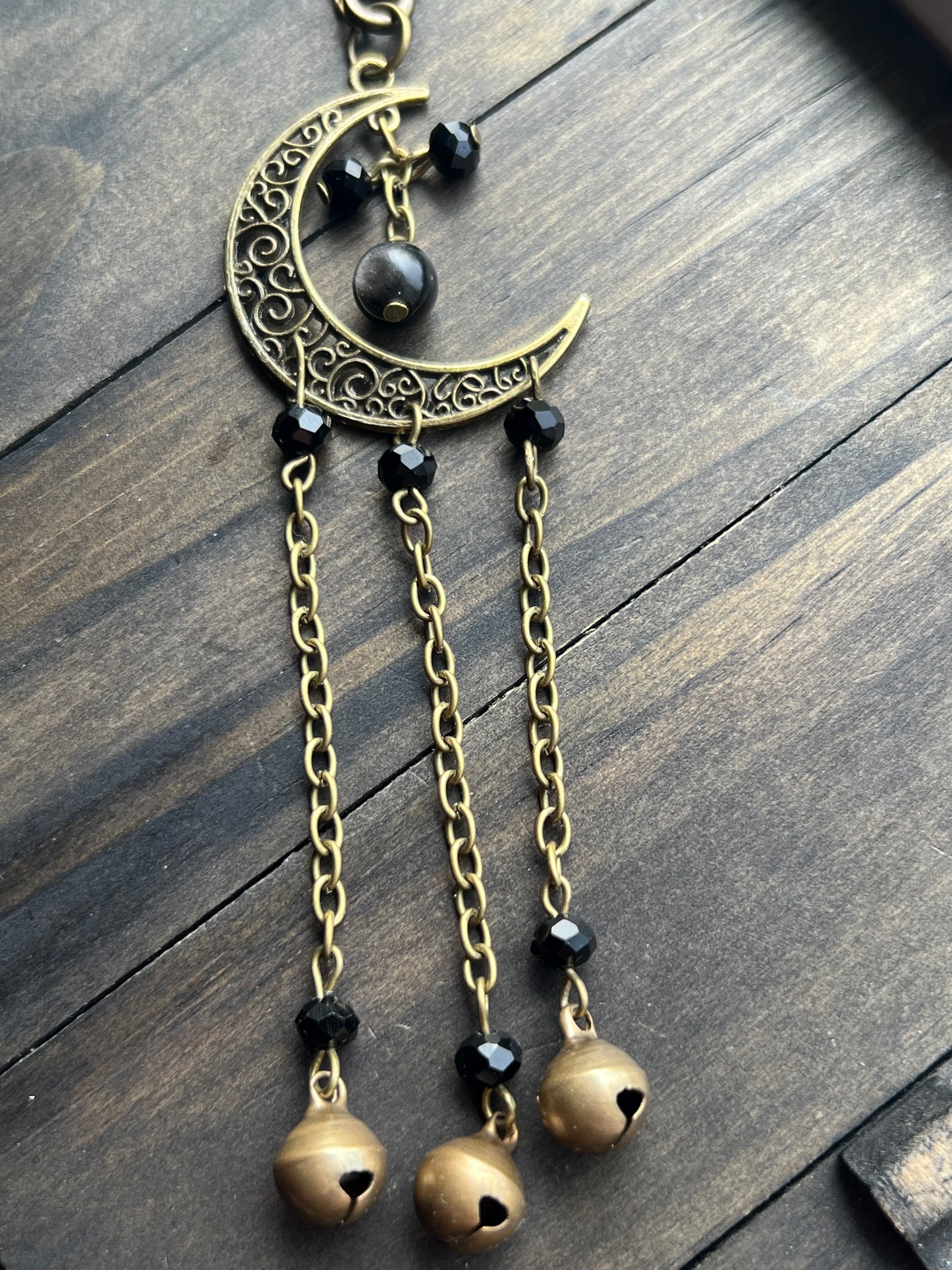 Bronze moon witch bells