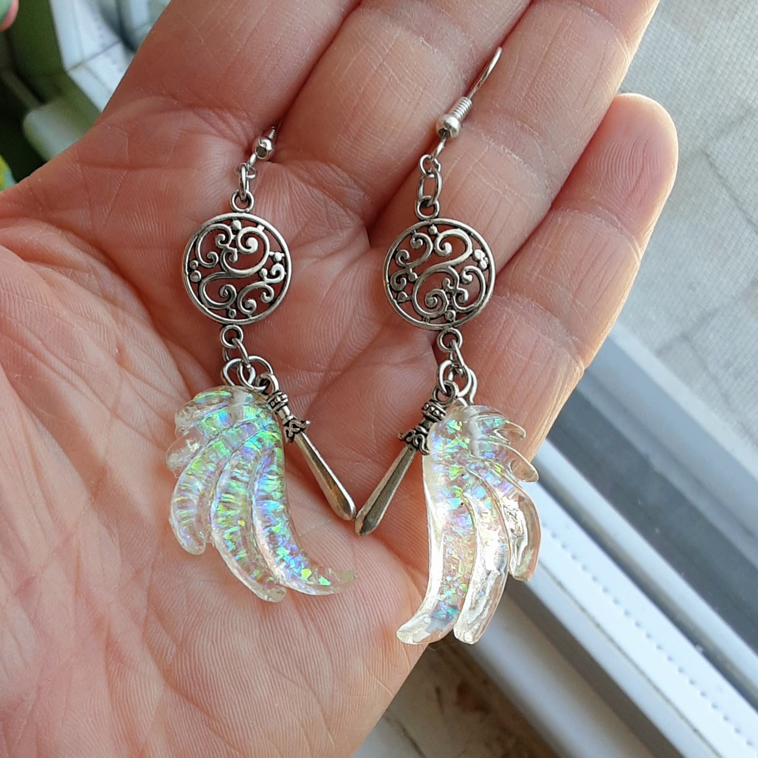 Valkyrie earrings with wings and swords