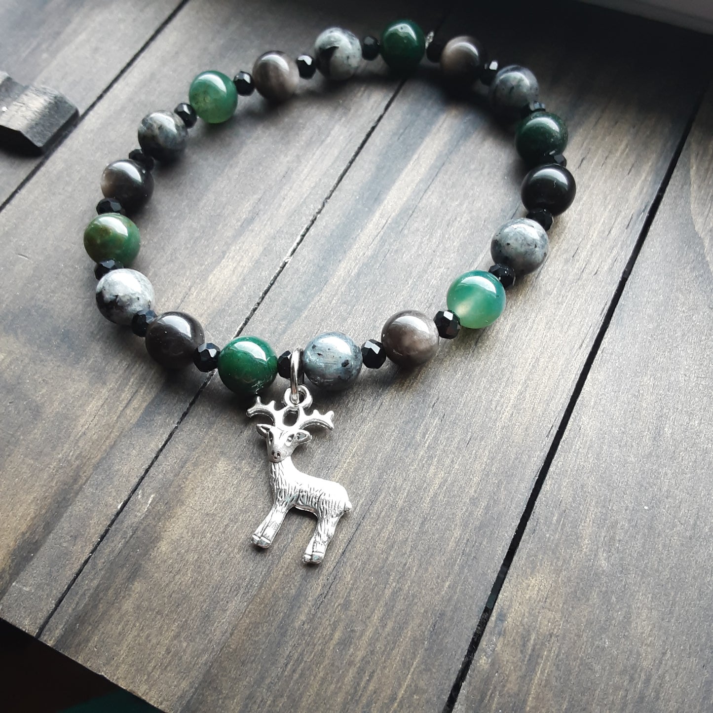 Stag bracelet with various gemstone