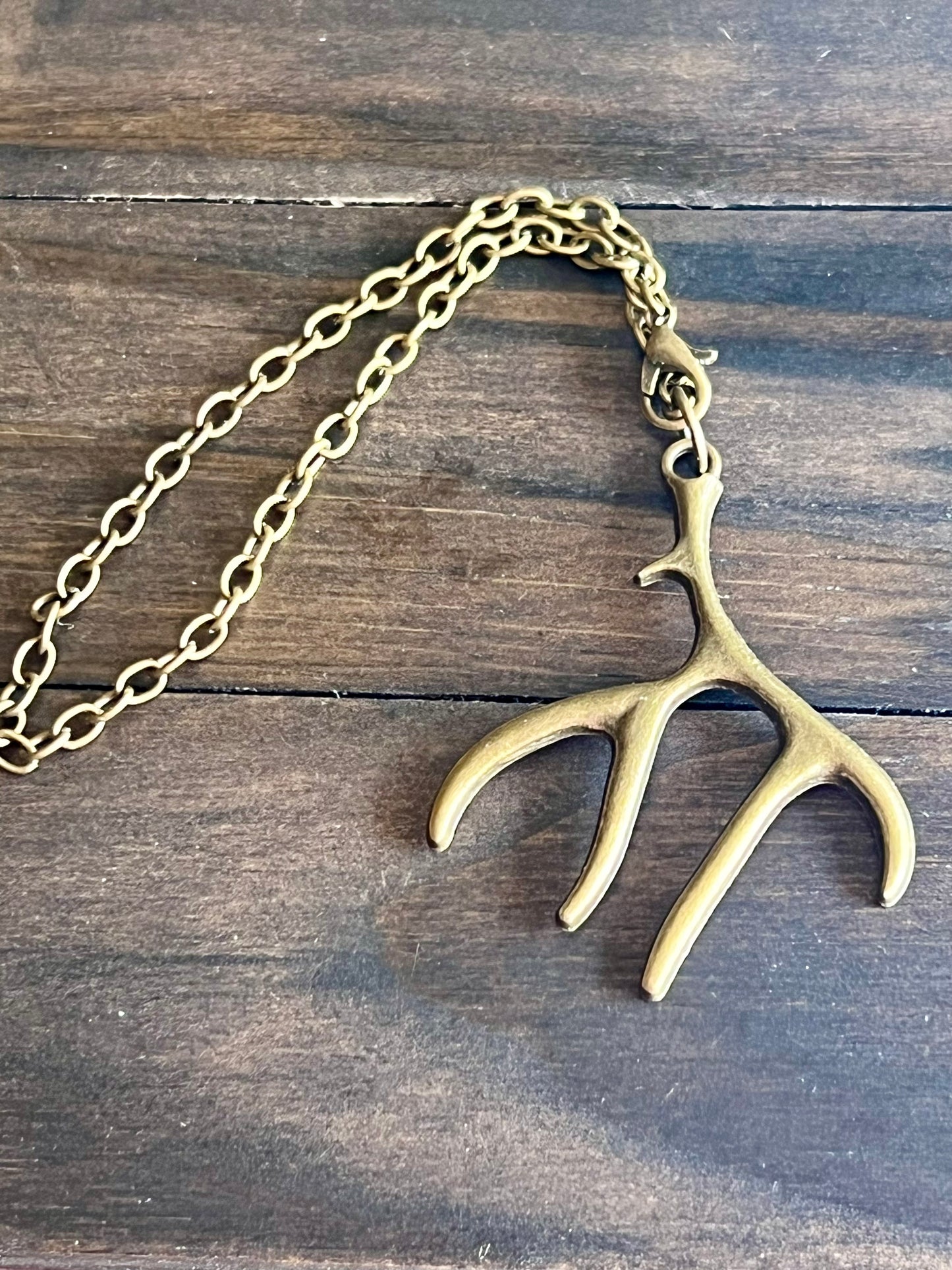 Bronze antler car charm