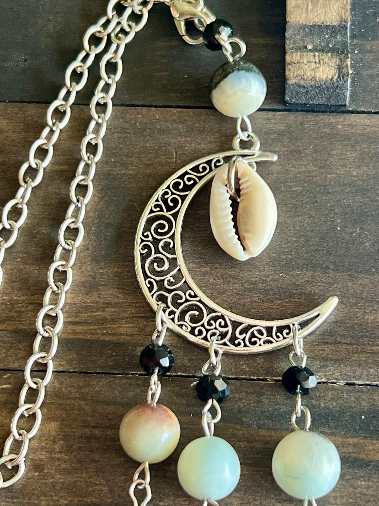 Shell moon witch bells