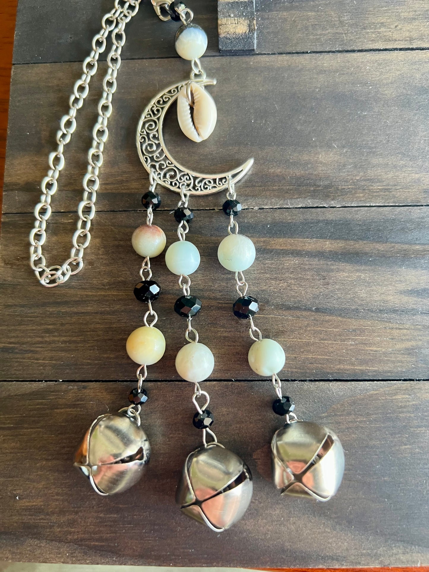 Shell moon witch bells