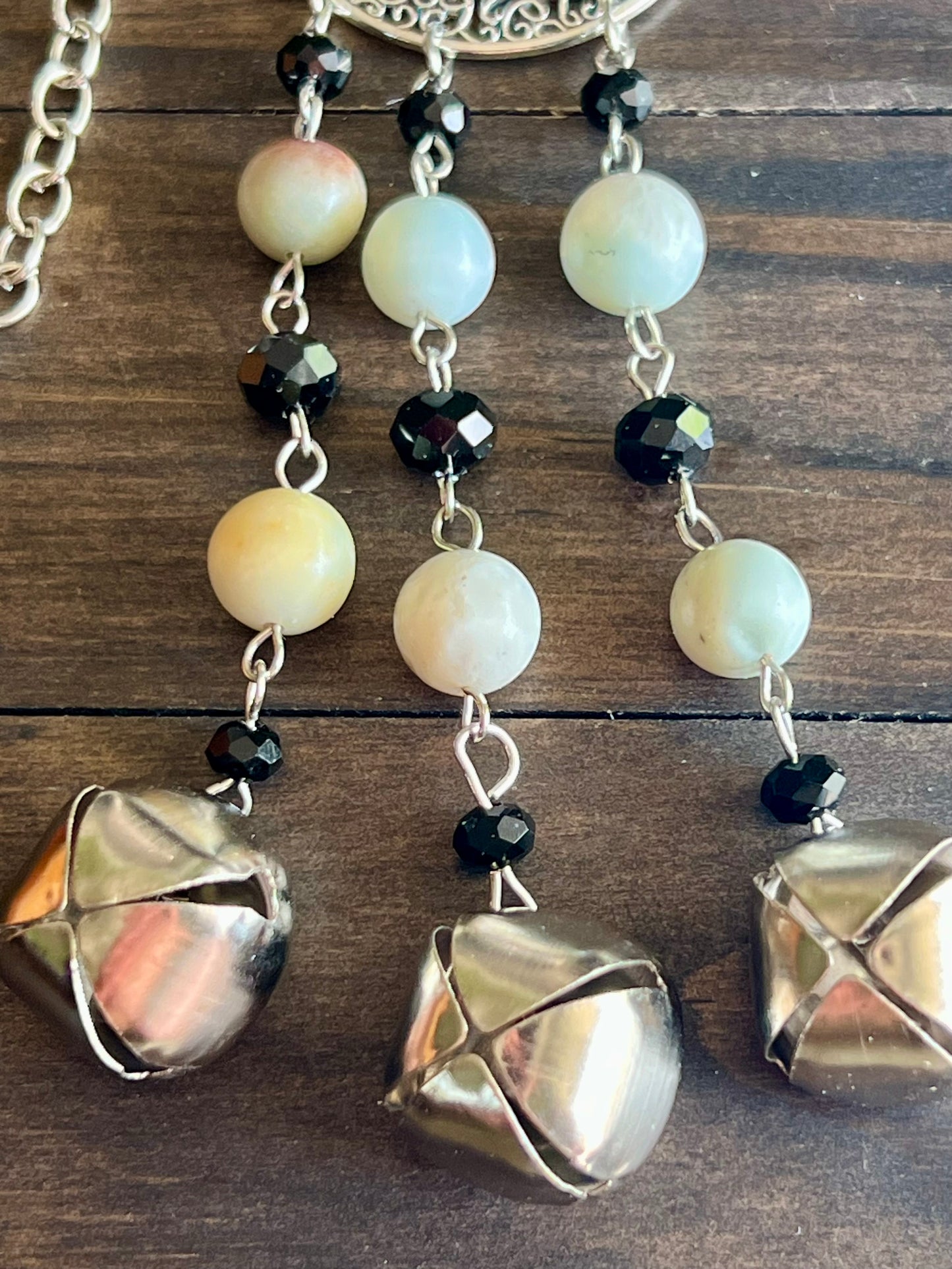 Shell moon witch bells
