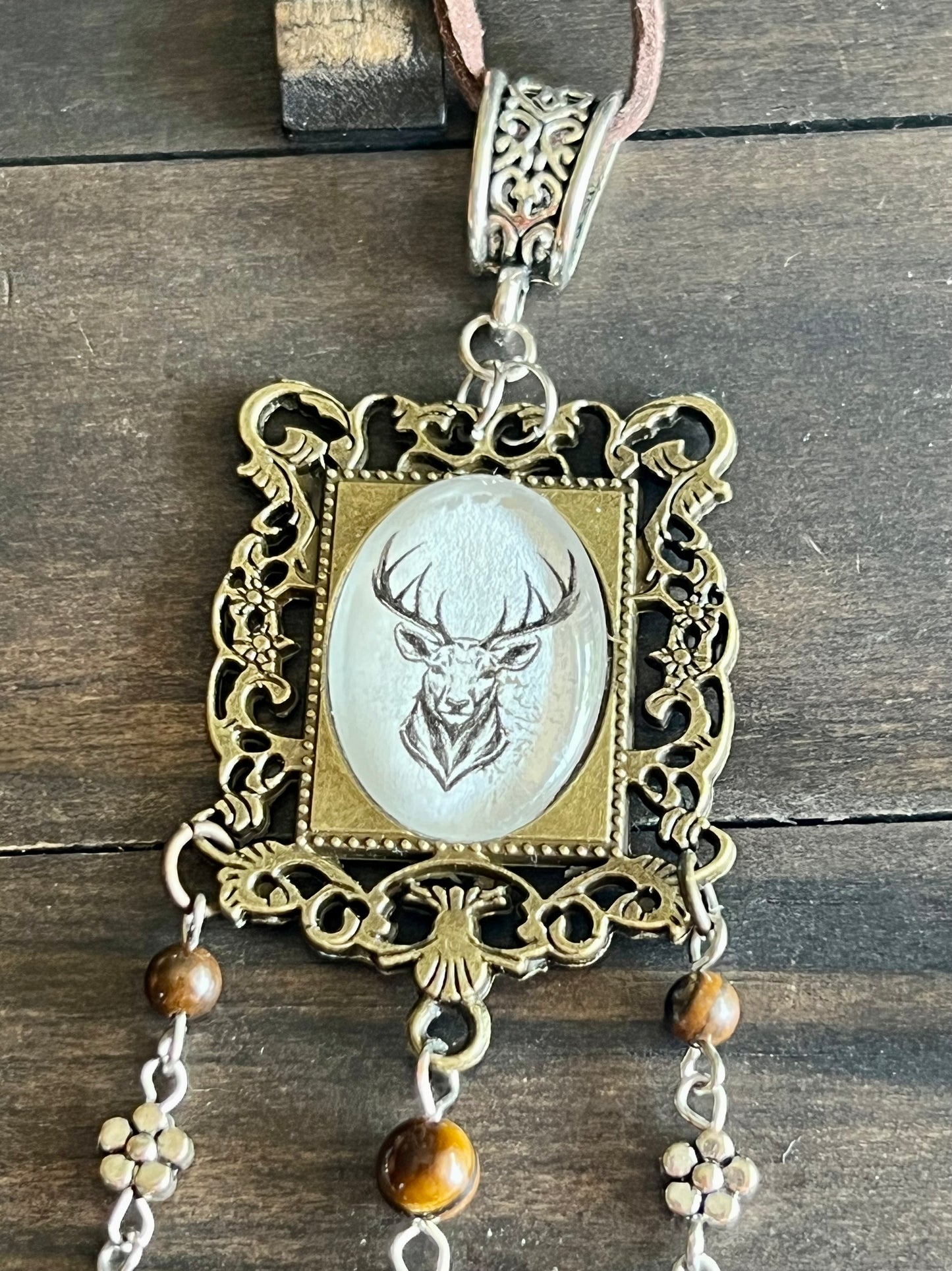 Bronze deer witch bells