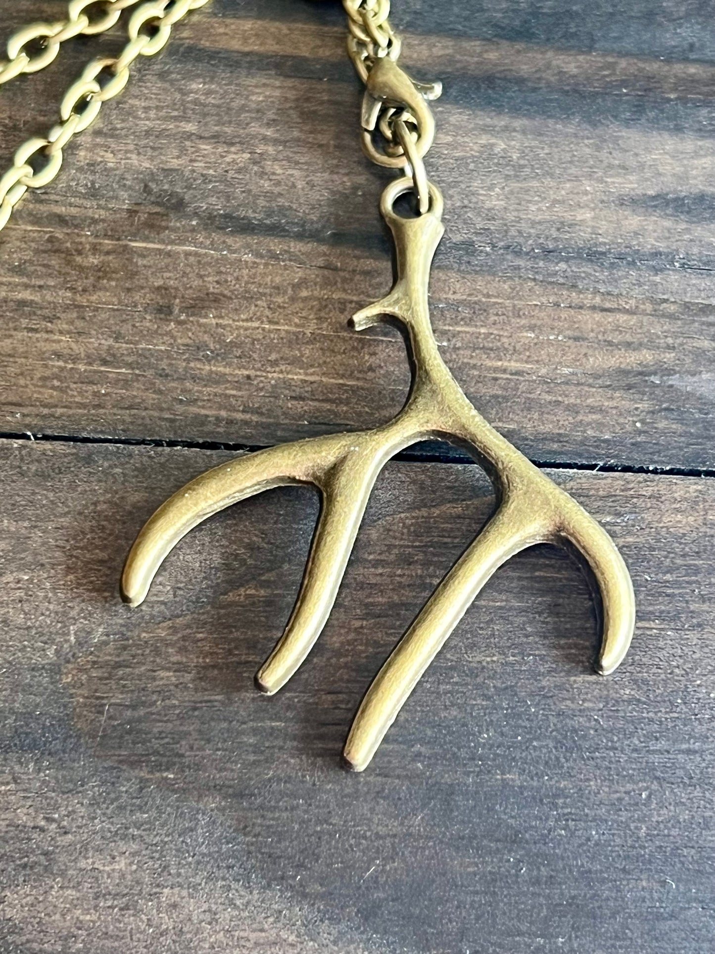 Bronze antler car charm