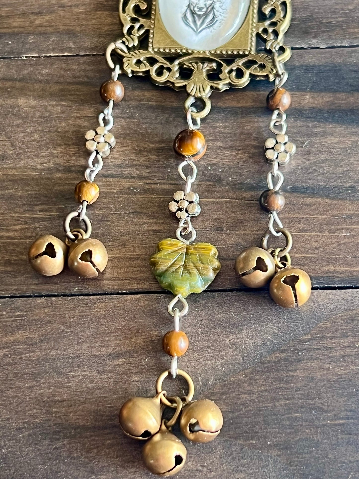 Bronze deer witch bells