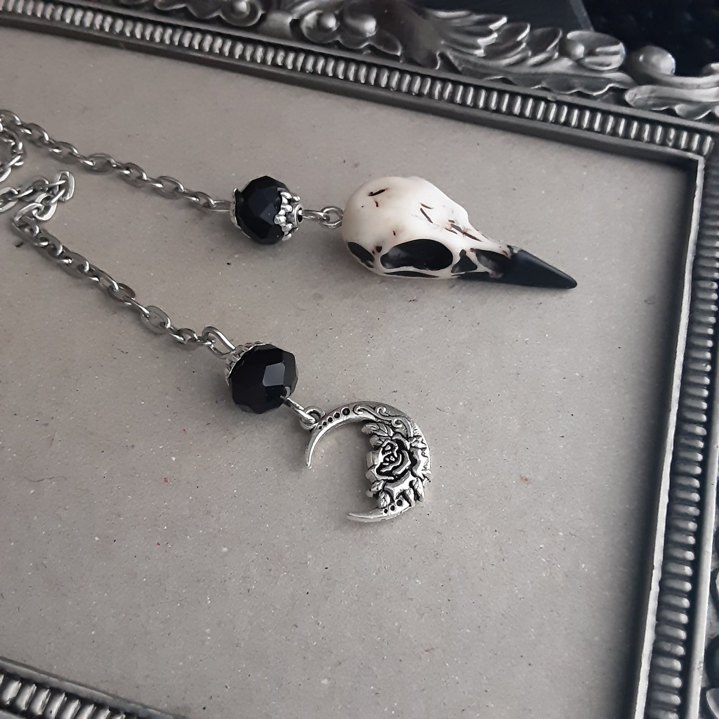 Raven skull pendulum