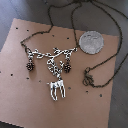 Stag necklace with pinecones