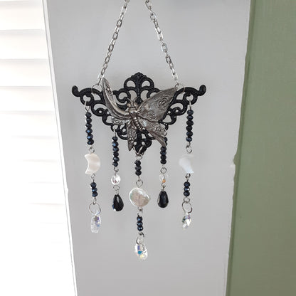 Butterfly wall hanging with moon phase