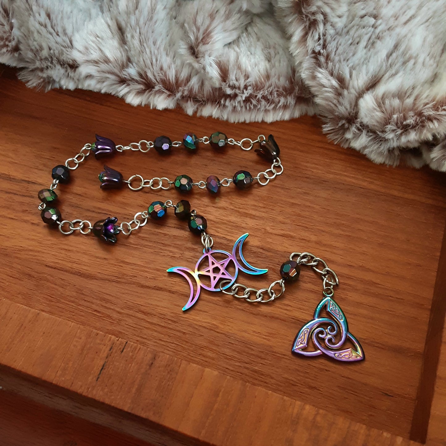 Triple Moon Goddess prayer beads with dark rainbow flowers
