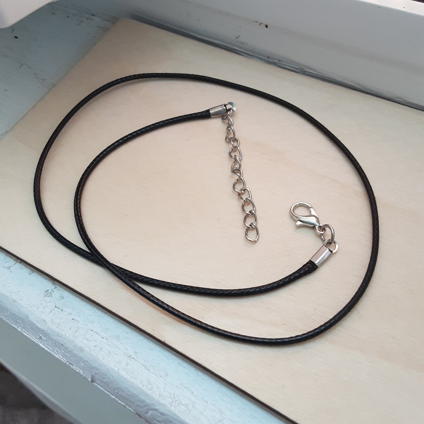 Black cord necklace