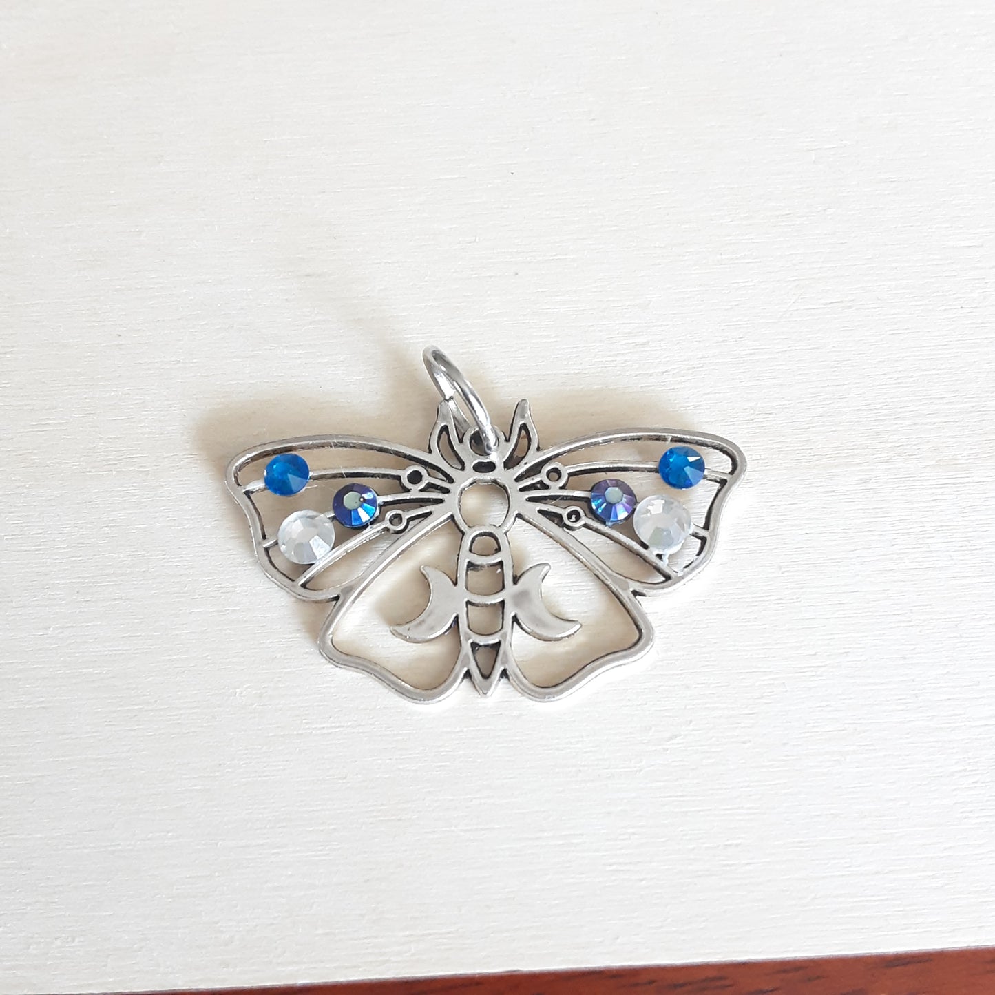 Lunar moth pendant with rhinestones