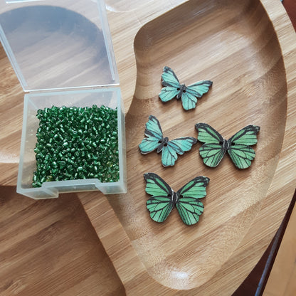 Butterfly and green bead lot