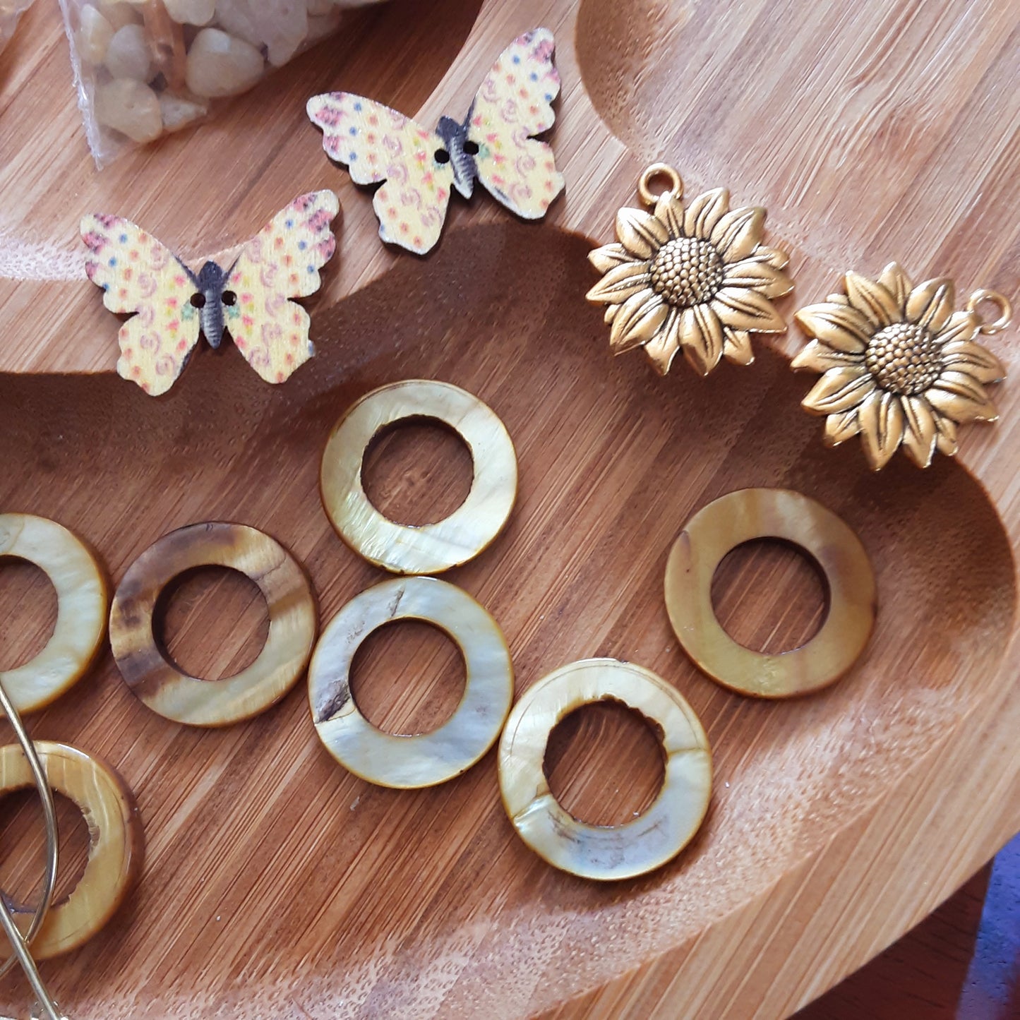 Butterfly, sun flower and bead mix