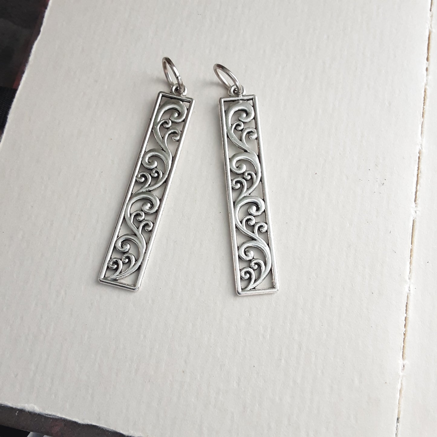 Silver pattern pendant, long rectangle