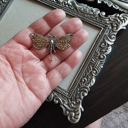 Orange glitter dragonfly pendant