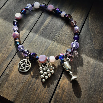 Dionysus bracelet with dark purple beads