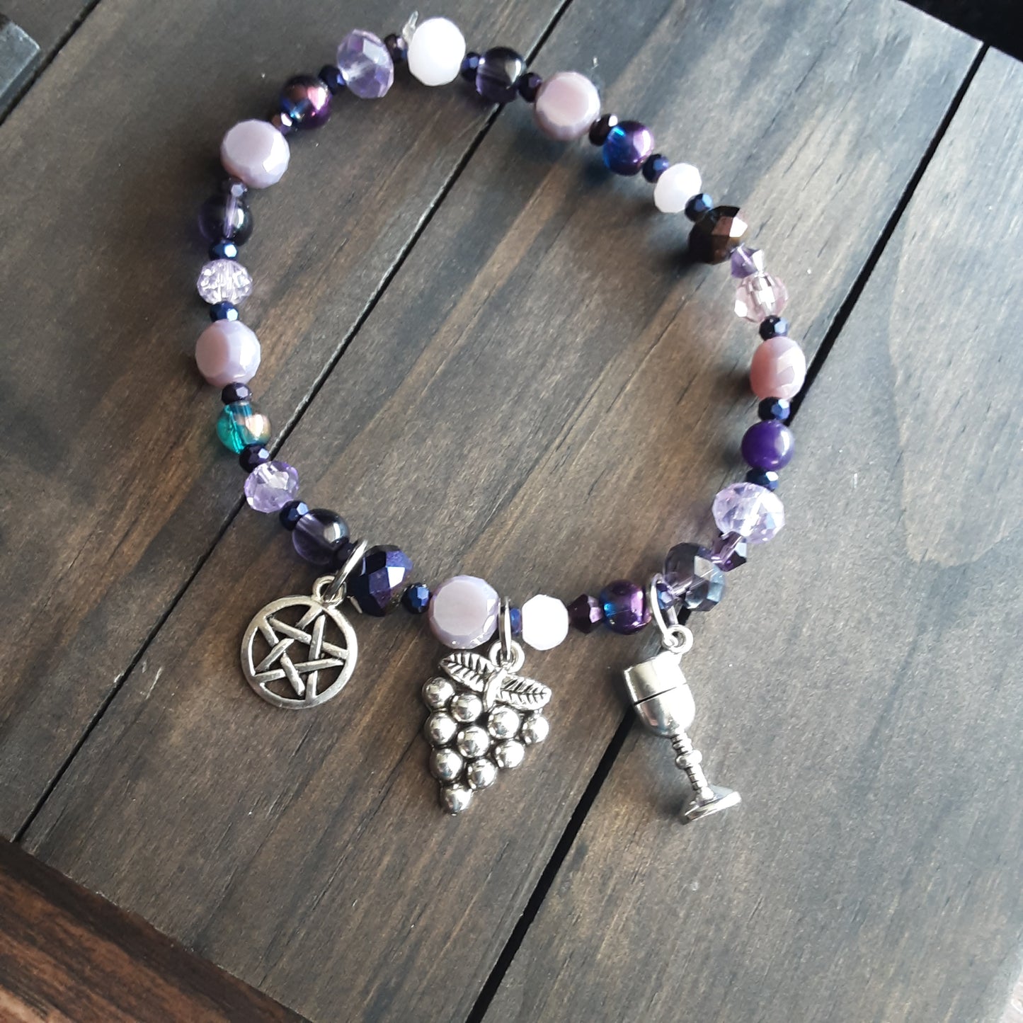 Dionysus bracelet with dark purple beads