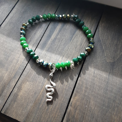 Loki bracelet with snake with various green crystals