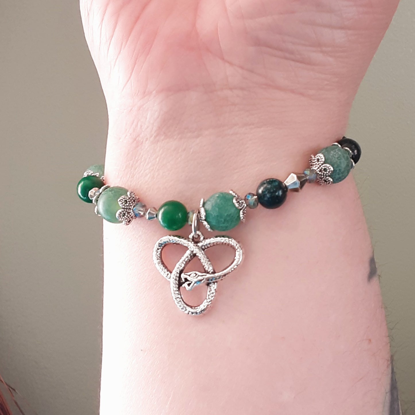 Loki bracelet with knotwork snake charm