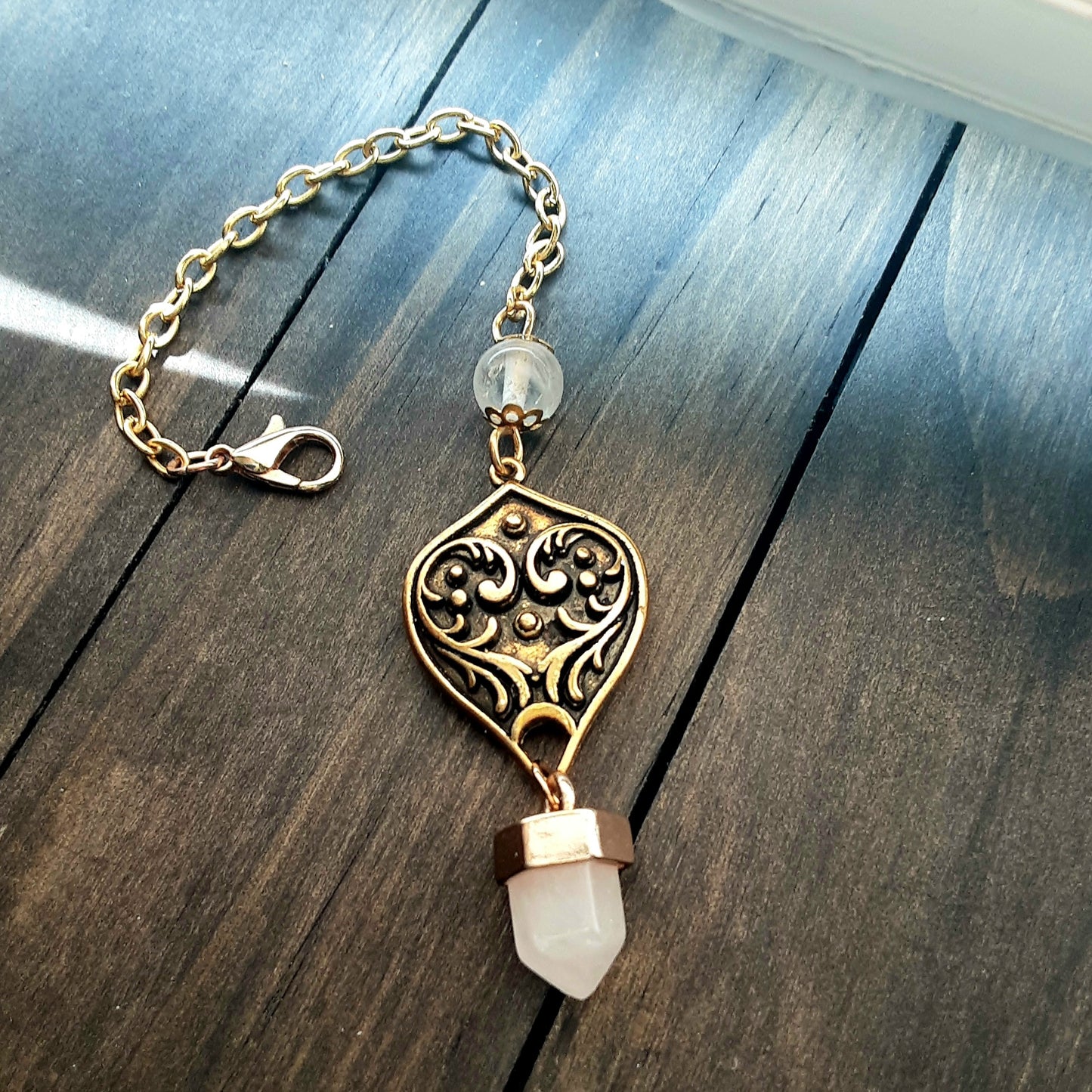 Clear Quartz pendulum with clasp