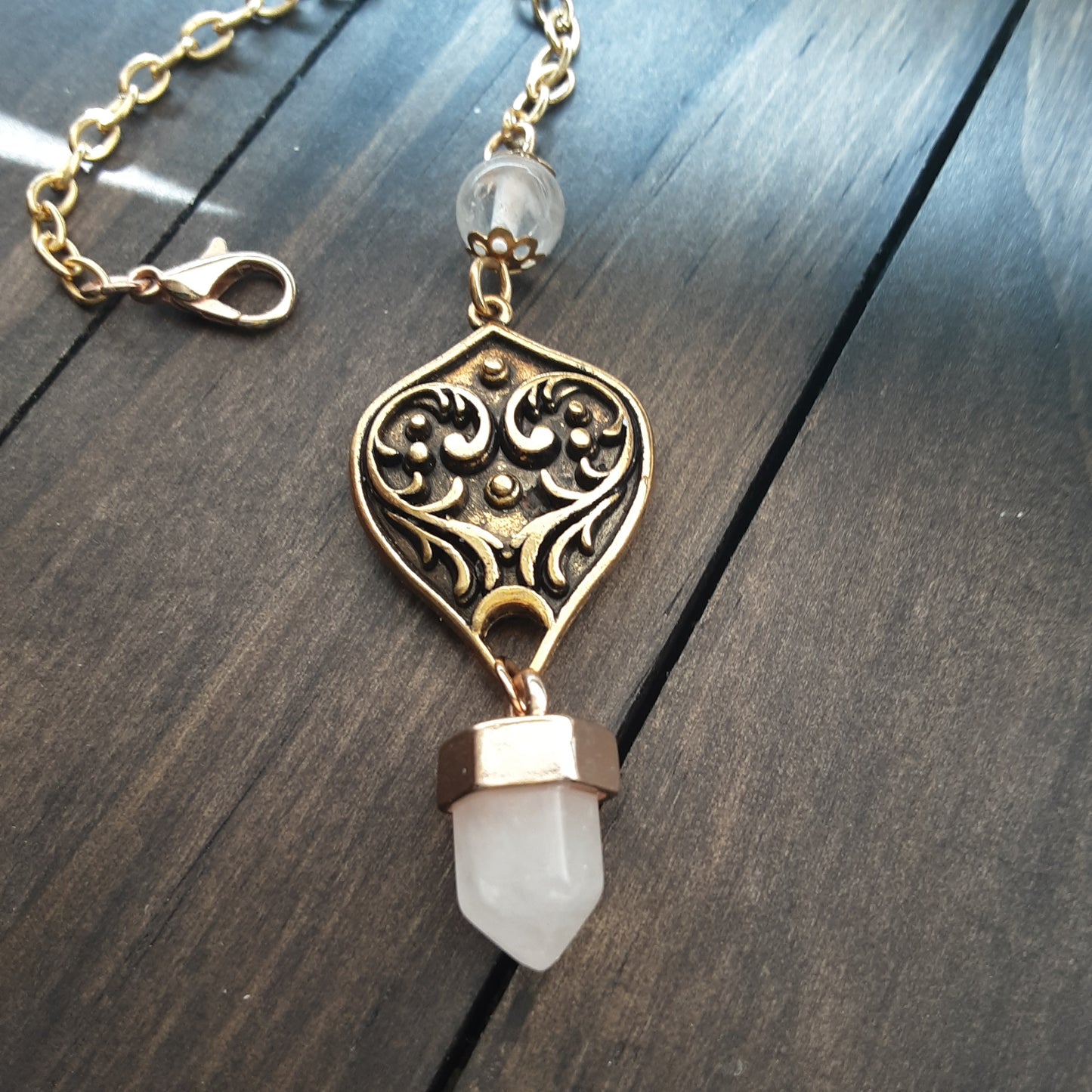 Clear Quartz pendulum with clasp