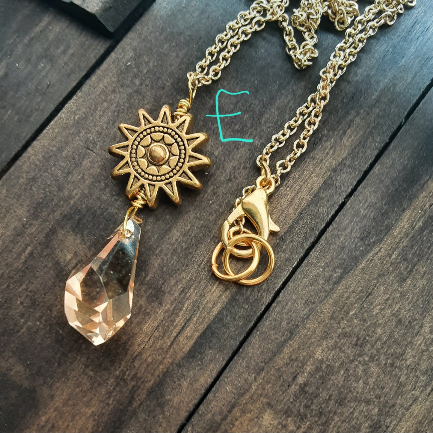 Apollo necklace with golden sun