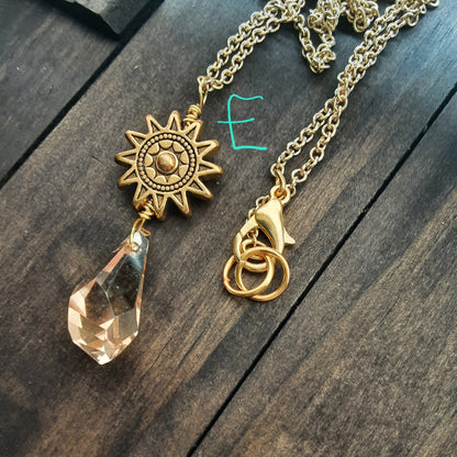 Apollo necklace with golden sun