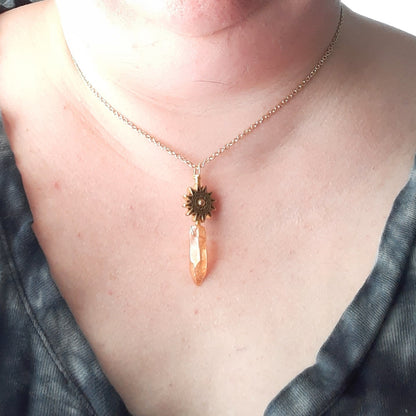 Apollo necklace with golden sun