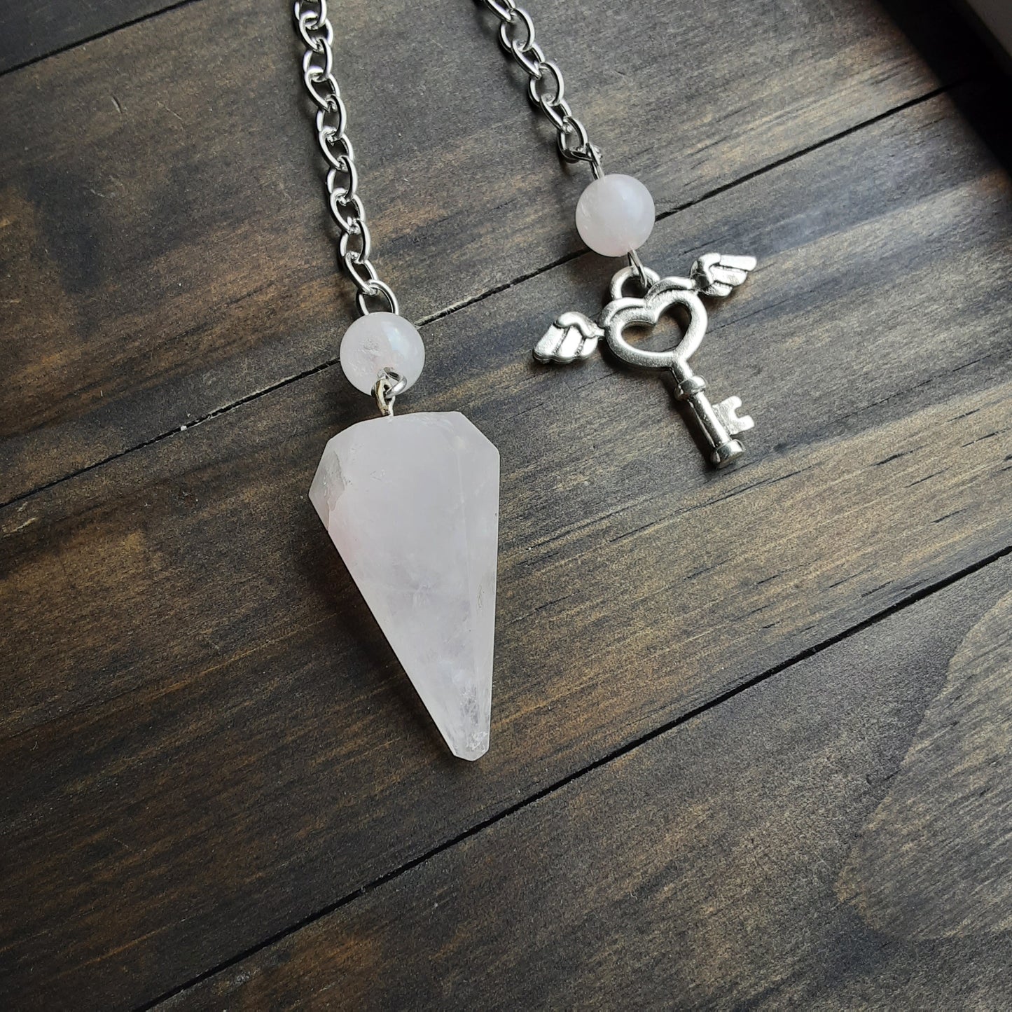 Rose Quartz pendulum, please read