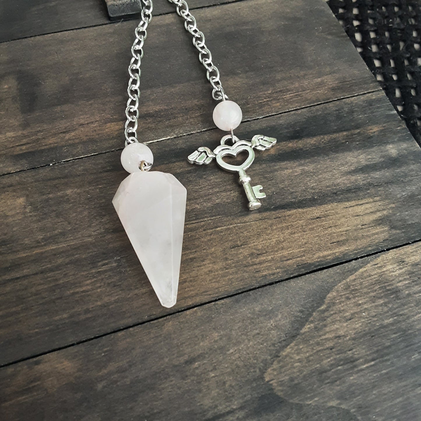 Rose Quartz pendulum, please read