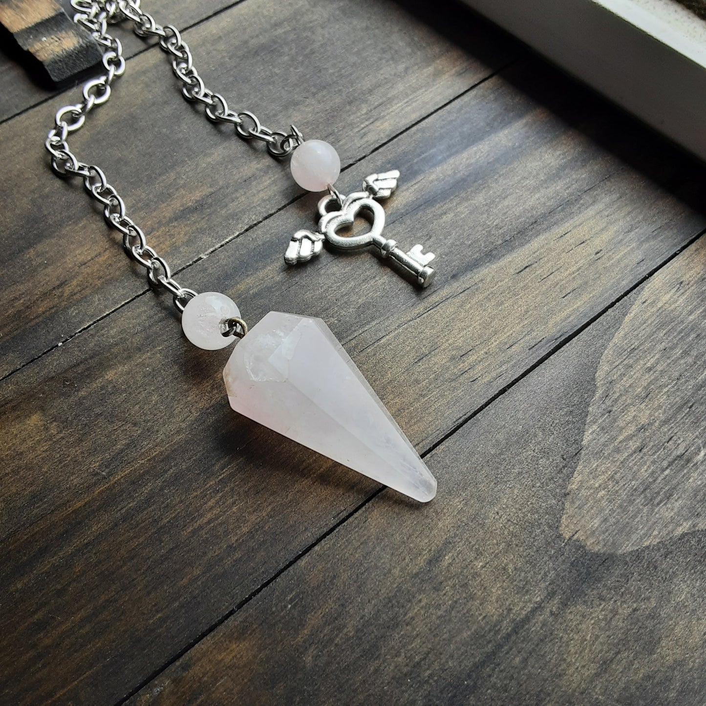 Rose Quartz pendulum, please read