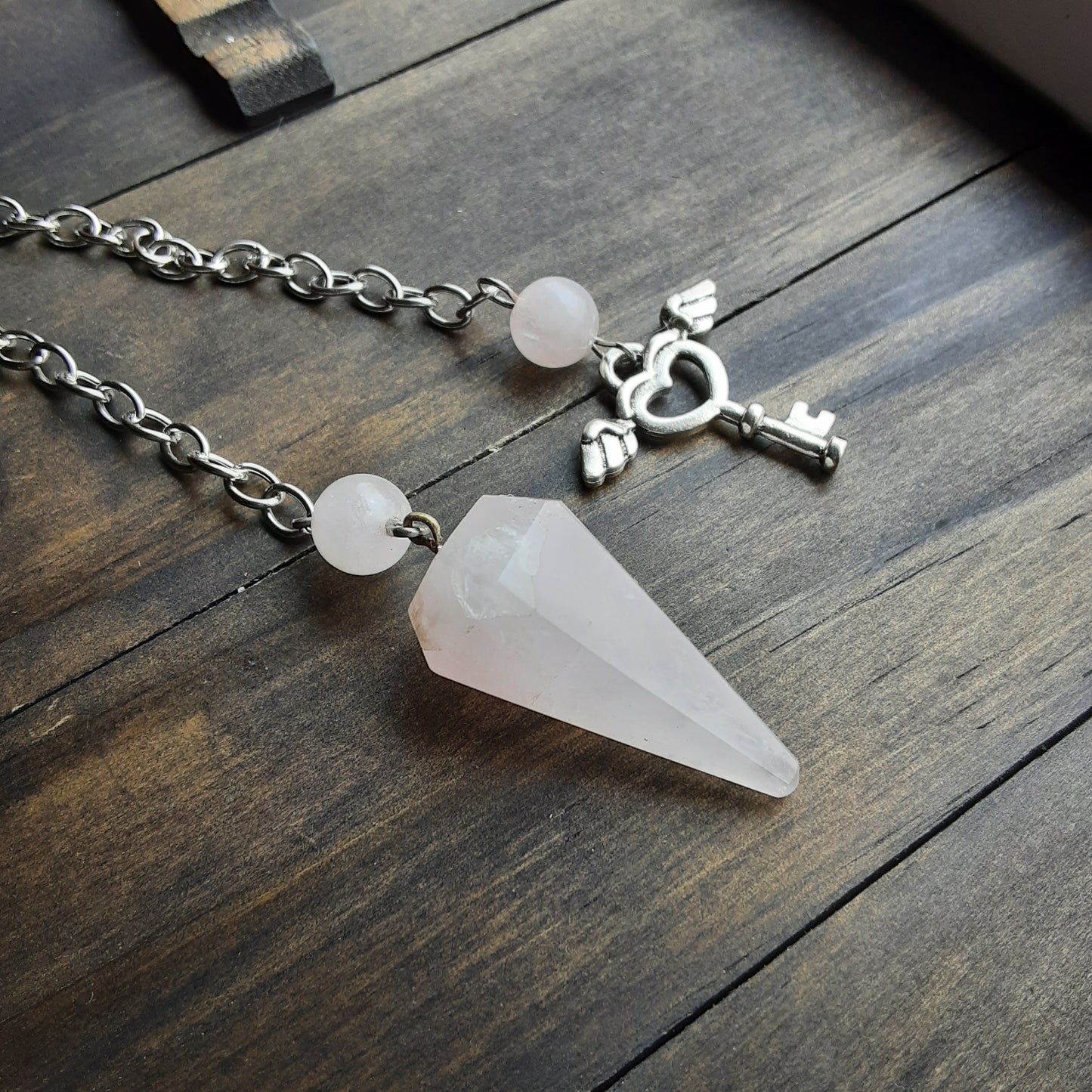 Rose Quartz pendulum, please read