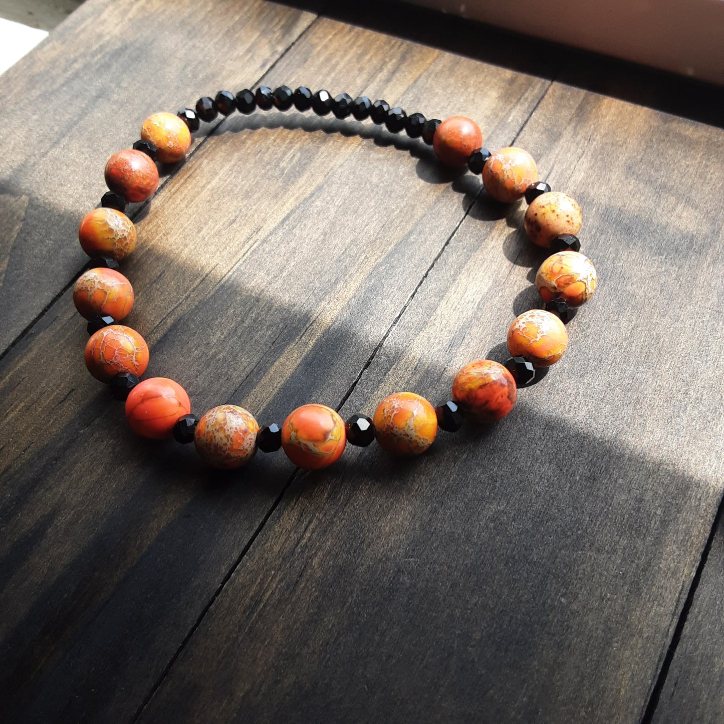 Orange and black bracelet