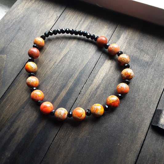 Orange and black bracelet