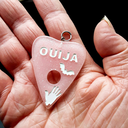 Pink ouija planchette pendant