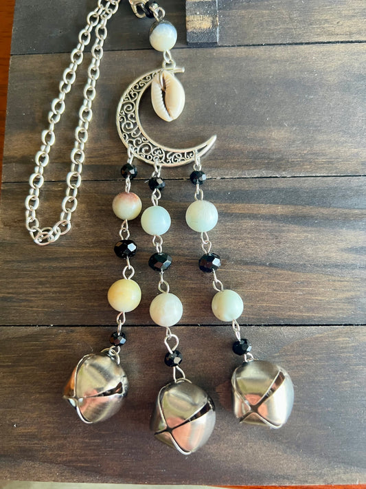 Shell moon witch bells