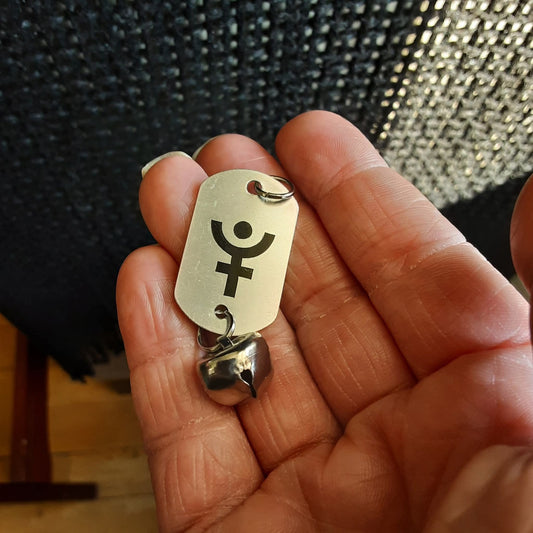 Pluto symbol charm with bell, please read