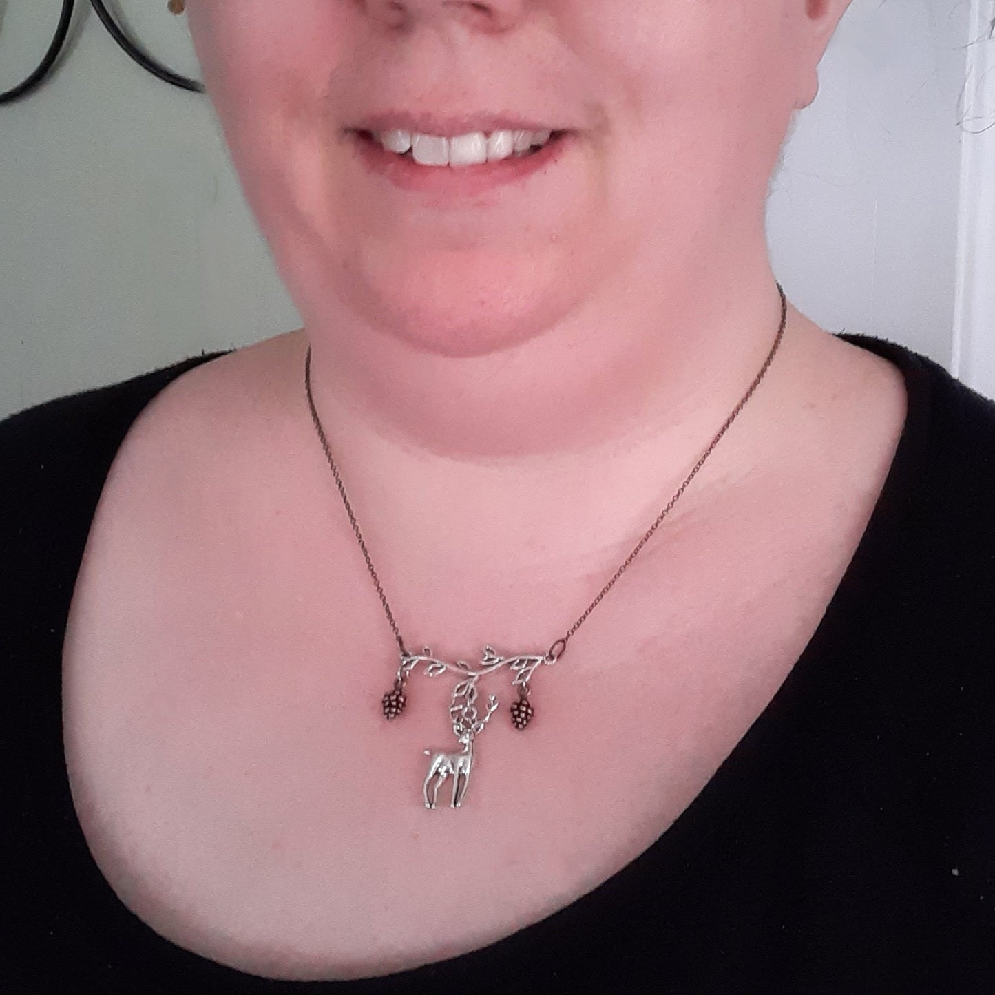 Stag necklace with pinecones