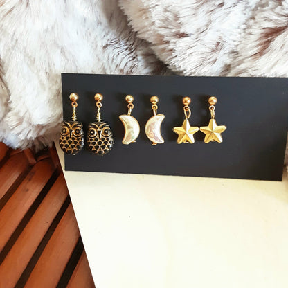 Earrings set with owls, moons and stars