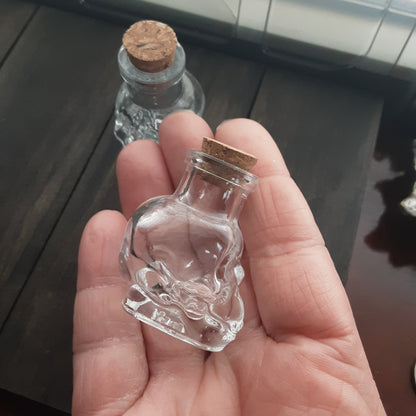 Small skull glass vial bottle